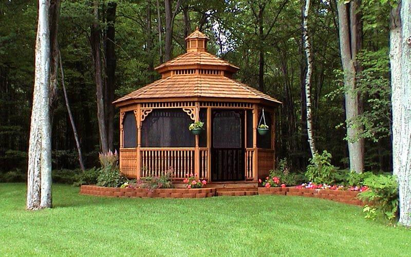 wooden gazebo with screens