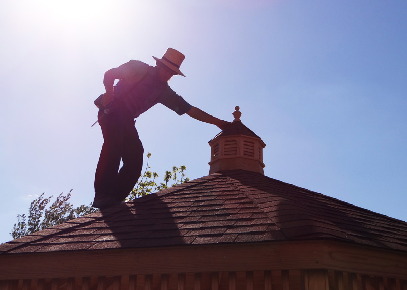 Amish Craftsman working on a gazebo