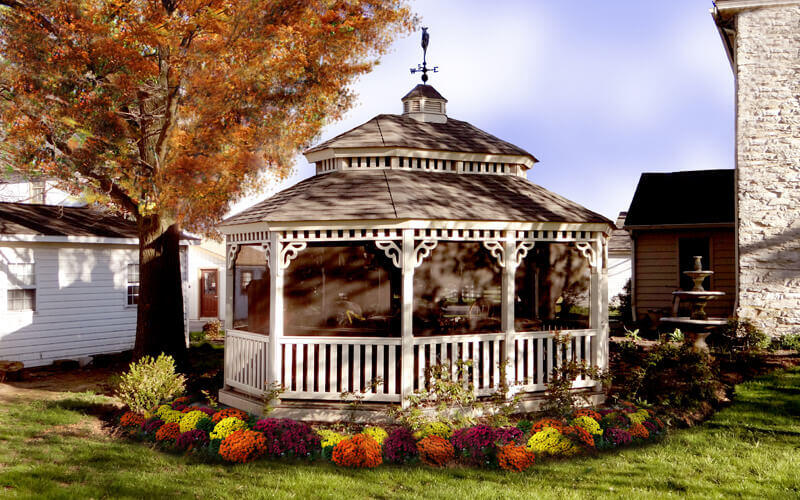 oval gazebo with weather vane and screens