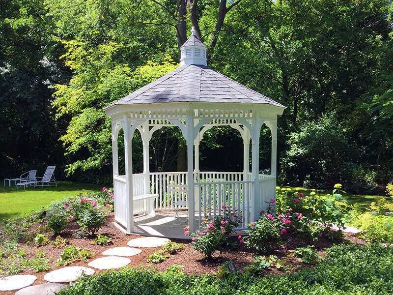 White gazebo in a garden