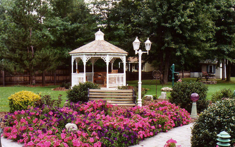 white gazebo in a garden