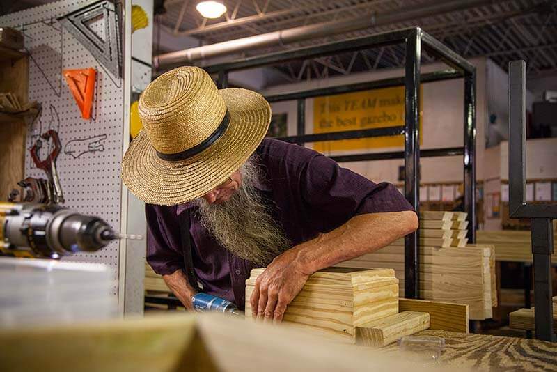 amish working on gazebos