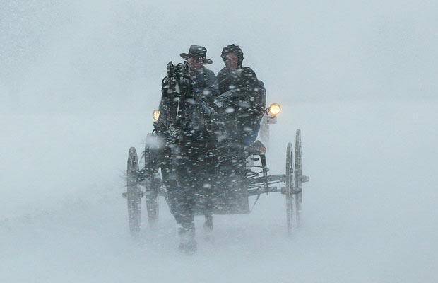 Amish individuals in the snow