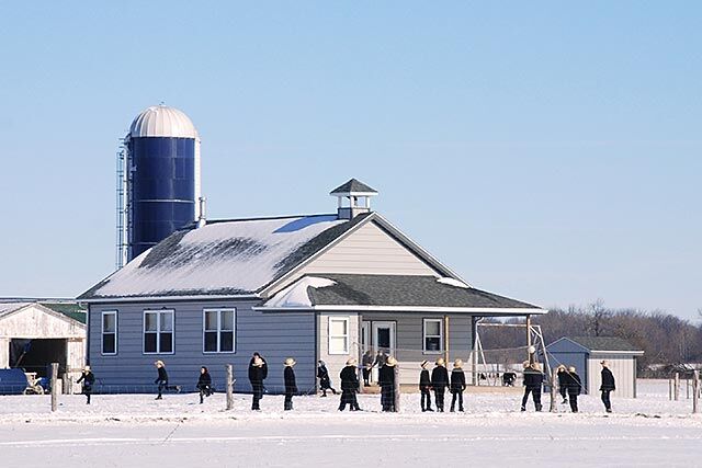 Amish people at a school house