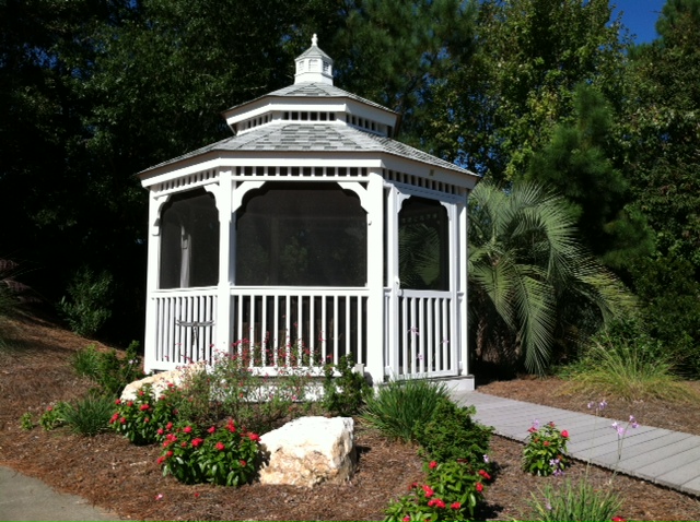 gazebo with two tiered roof and screens