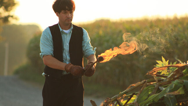 amish lighting a fire