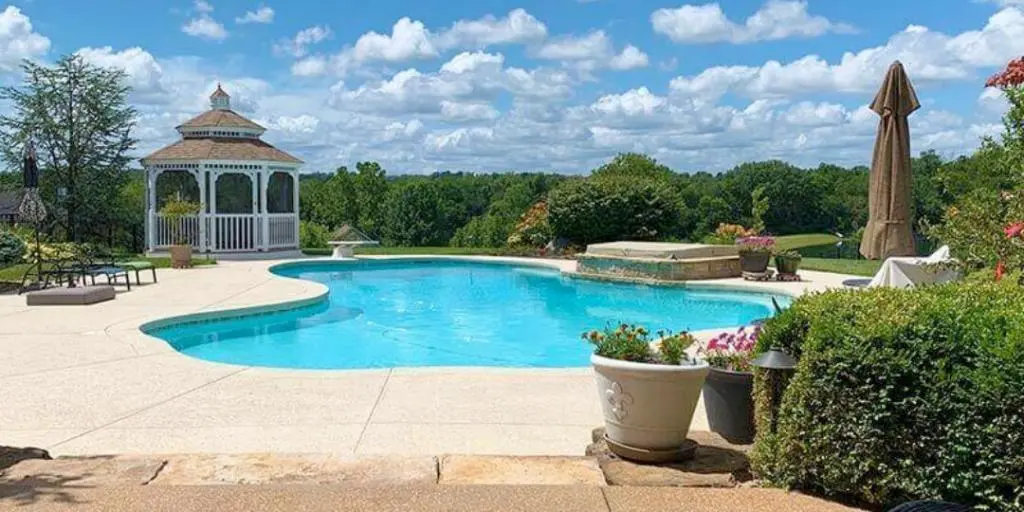 Outdoor gazebo next to a pool