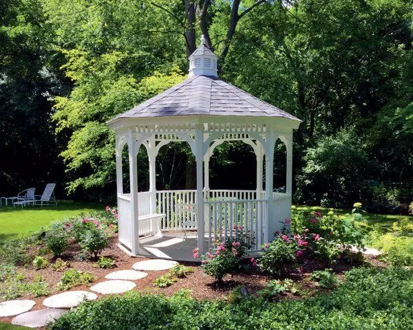 Vinyl Gazebo in a garden with a stone path