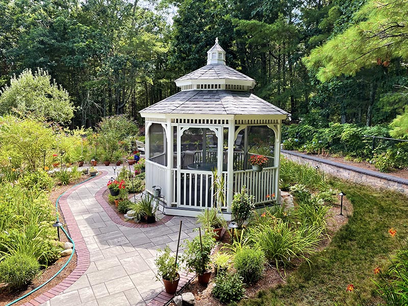 screened oval gazebo in a backyard requires a permanent structure permit